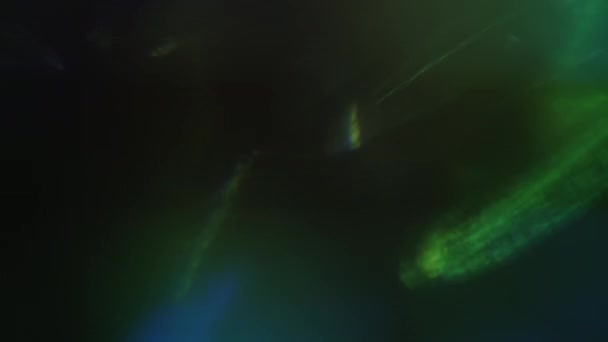 フェスティバルホログラフィックレンズフレア。超現実的な光の遷移。暗い空間における光の平和. — ストック動画