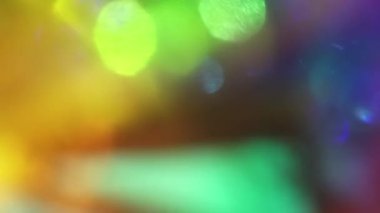 Holografik arka plan döngüsü. Doğal ışık başkalaşımları. Karanlıkta ışık titreşimleri. Üst düzey web projesi için kullanılabilir.