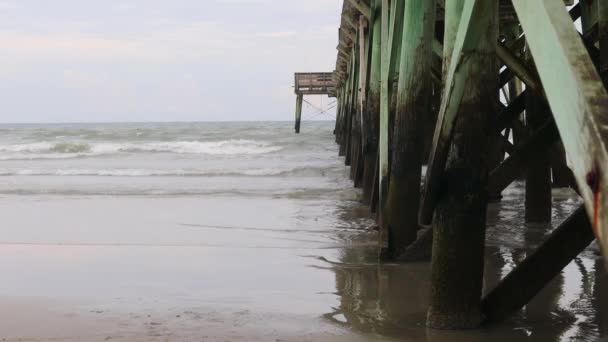 Static Medium Shot End Wooden Pier Out Ocean — стоковое видео