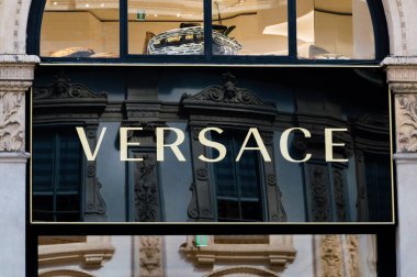 Milan, Italy - May 29, 2018: Versace logo at galleria Vittorio Emanuele II. clipart
