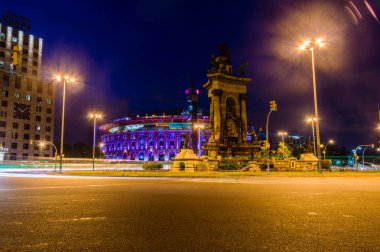 Barcelona, Spain - June 6, 2018: Placa d'Espanya (Plaza de Espana) with the Plaza de toros de las Arenas at night.