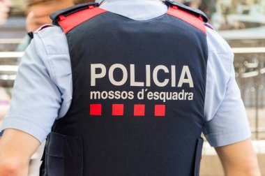 Kurşun geçirmez yelek oradaki ekibimde (polis gücü Katalonya) işareti.
