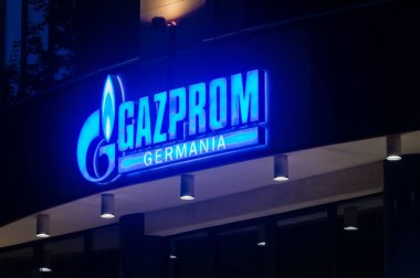 Berlin, Germany - August 15, 2018: Logo and sign of Gazprom Germania. clipart