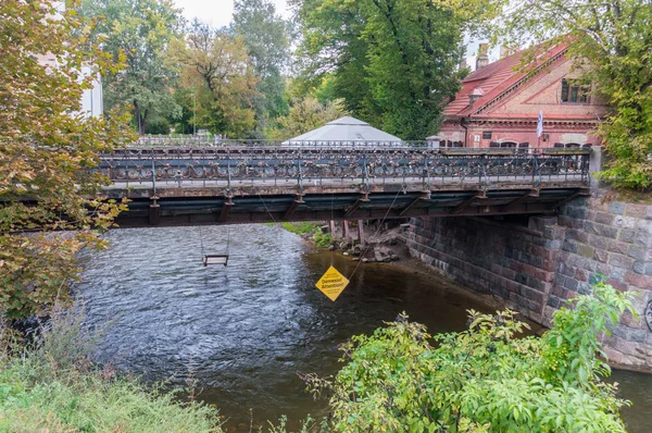 Bridge of Uzupis with swing. — Stock Photo, Image