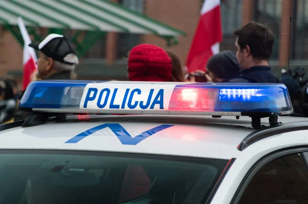 Policja 車のライト Policja は警察のためのポーランド語単語です — ストック写真