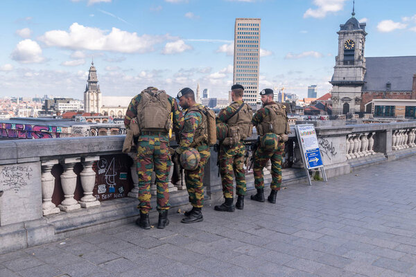 Brussels, Belgium - June 6, 2019: Belgian soldiers at place Poelaert Brussels near Memorial for the Belgian Foot Soldiers.