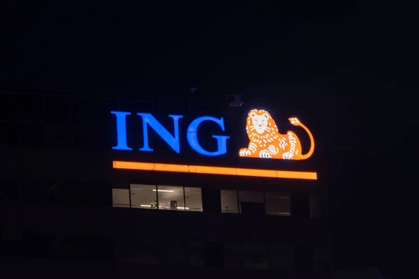 Illuminated logo of ING Group. ING Group is a Dutch multinational banking and financial services corporation. — Stock Photo, Image