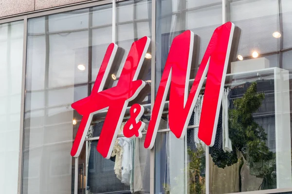 Close-up of H&M logo. H & M Hennes & Mauritz AB is a Swedish multinational retail-clothing company. — Stock Photo, Image