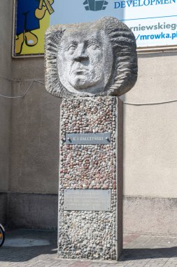Pisz, Poland - June 1, 2020: Sculpture of the poet Konstanty Ildefons Galczynski in Pisz. clipart