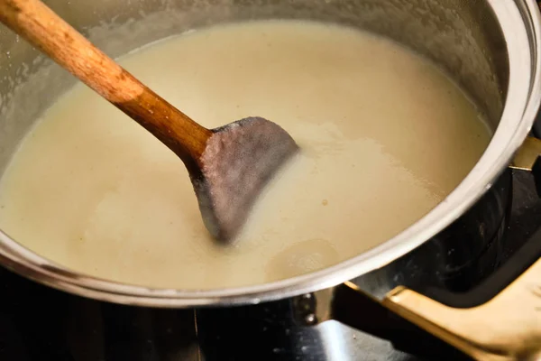 Preparing Semolina Puding Cooking Fine Semolina Milk Stir Wooden Spoon — Stock Photo, Image