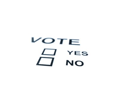 Genel bir Evet ya da Hayır oylama oy açık alan ve kısmen odak dışı beyaz bir arka plan üzerinde izole fotoğrafı kapatın.