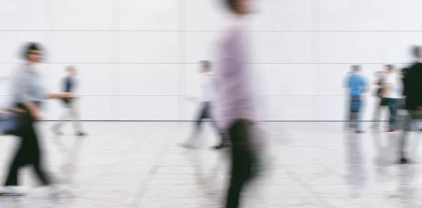 Crowd of people walking on a street in london