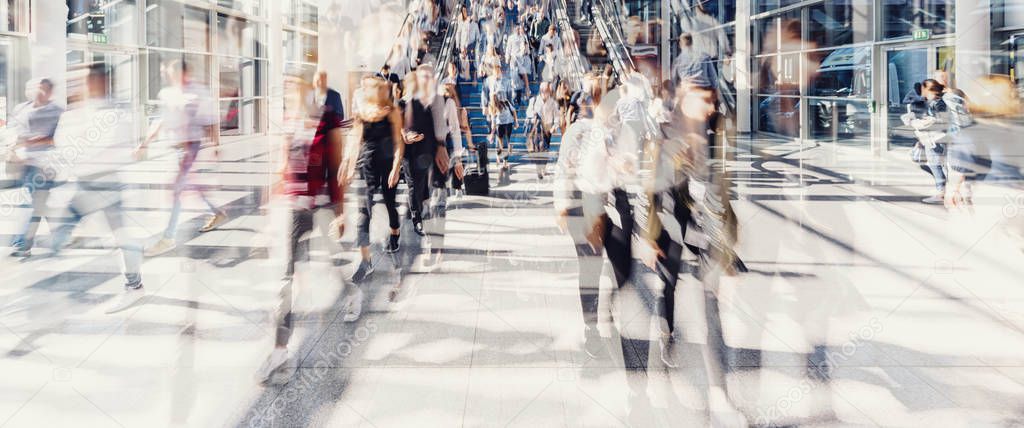 Crowd of people walking on a street in New York City