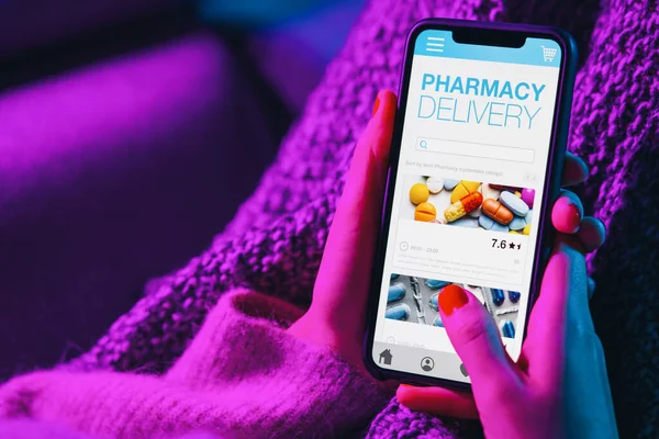 Woman Lies Sofa Holding Mobile Phone Internet Pharmacy Shopping App — Stok Foto