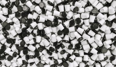 pile of many empty to go coffee cups ecology concept