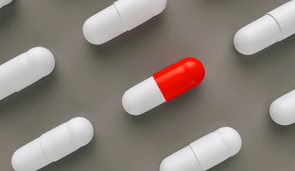 红白相间的药丸或胶囊依次排列 药丸抗生素 药理主题 — 图库照片
