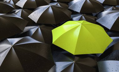 Unique green umbrella among many dark ones. Standing out from crowd, individuality and difference concept