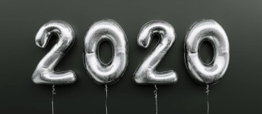Happy New 2020 celebration. Silver foil balloons numeral 2020 on black background