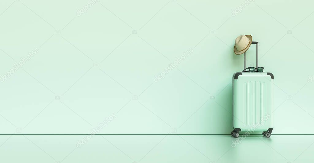 mint green suitcase with sun glasses, hat on pastel mint green background. travel concept, with copy space for individual text