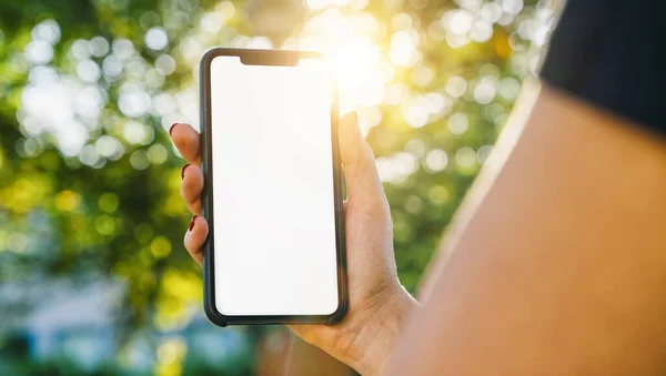 Mockup Image Woman Hands Holding Black Smartphone White Blank Screen — Stockfoto