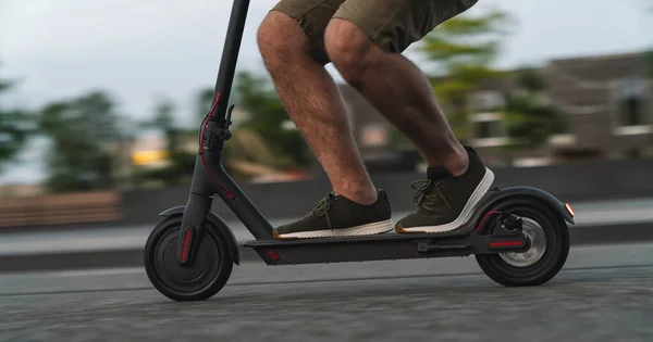 Close Man Riding Black Electric Kick Scooter Cityscape Night Motion — Stock Photo, Image