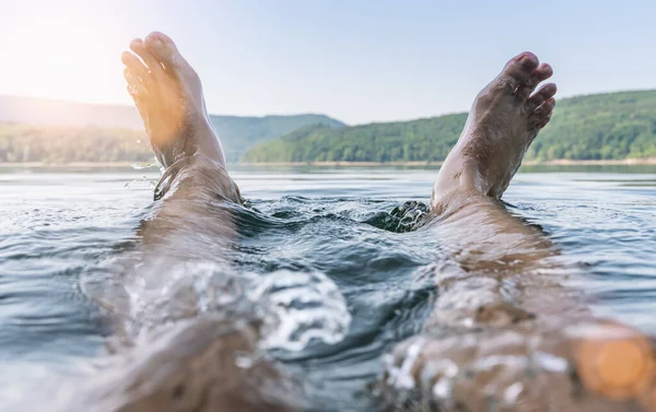 Happy Man Having Fun Splashing Water His Feet Lake — Stockfoto