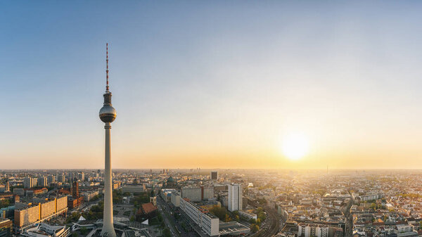 Berlin skyline Panorama Aerial view with famous TV tower at Alexanderplatz in twilight during blue hour at dusk, Germany. copyspace for your individual text.