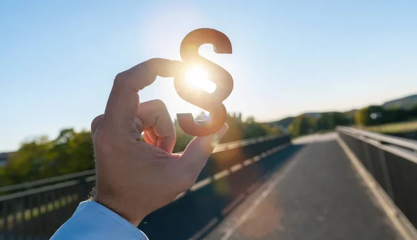 Businessman Holds Paragraph Sun — Stock Photo, Image