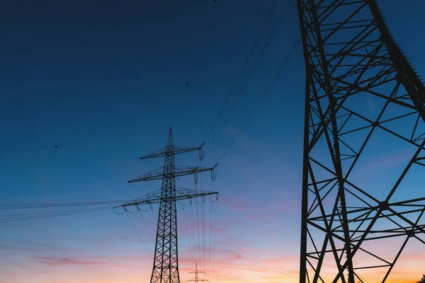 Linhas Transmissão Energia Elétrica Pôr Sol — Fotografia de Stock