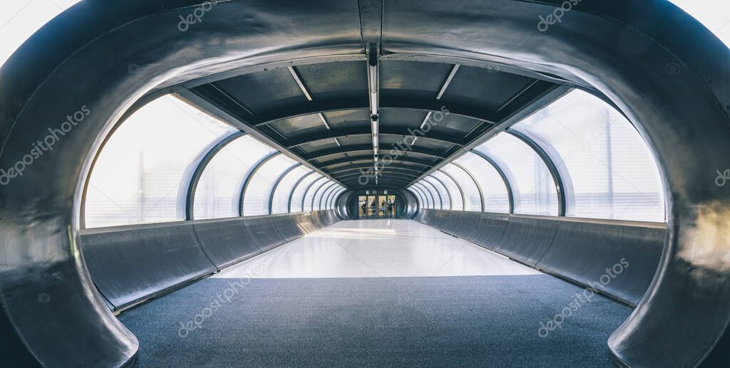 Abstract Futuristic dark corridor tunnel with light window background