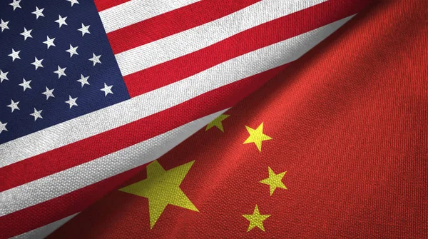 United States and China flags together textile cloth, fabric texture