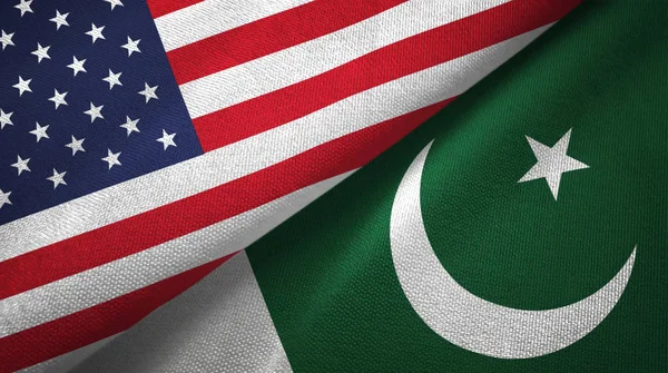 United States and Pakistan flags together textile cloth, fabric texture