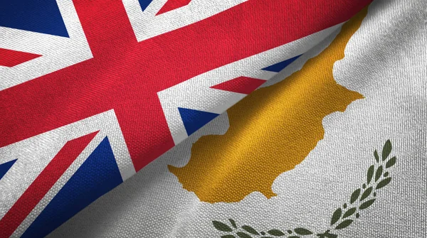 United Kingdom and Cyprus flags together relations textile cloth, fabric texture