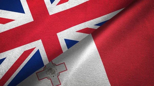 Storbritannien Och Malta Flaggor Grupp Förbindelserna Textil Duk Tyg Textur — Stockfoto