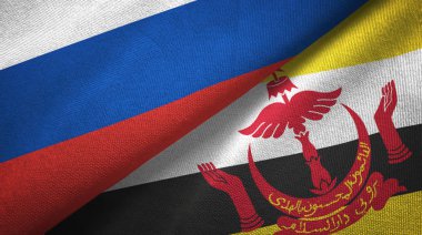 Rusya ve Brunei Darussalam bayrakları birlikte ilişkiler tekstil kumaş, kumaş dokusu. Metin brunei bayrağı anlamına gelir - her zaman Tanrı'nın rehberlik hizmetinde