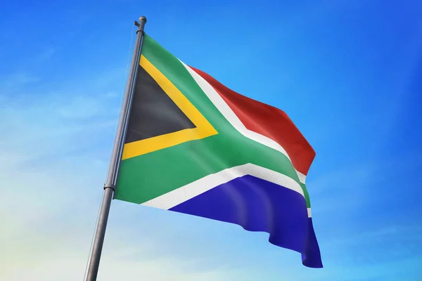 南非国旗在风中在蓝天上飘扬 — 图库照片