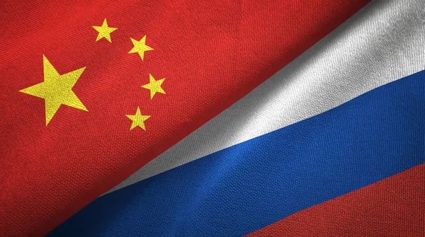 China and Russia flags together relations textile cloth, fabric texture