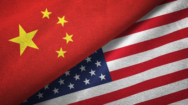 China and United States flags together relations textile cloth, fabric texture