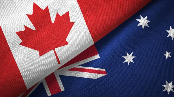 Canada and Australia flags together relations textile cloth, fabric texture