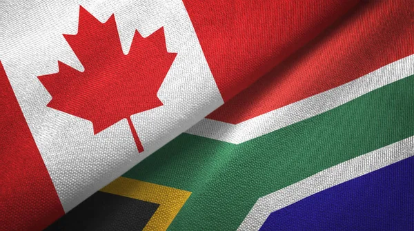 Canada and South Africa flags together relations textile cloth, fabric texture