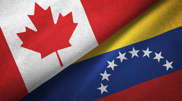 Canada and Venezuela flags together relations textile cloth, fabric texture