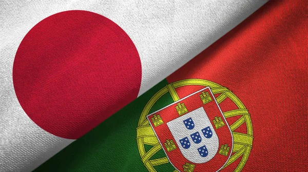 Japan and Portugal flags together textile cloth, fabric texture