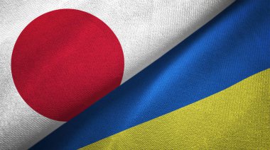 Japonya ve Ukrayna bayrakları birlikte tekstil kumaş, kumaş doku