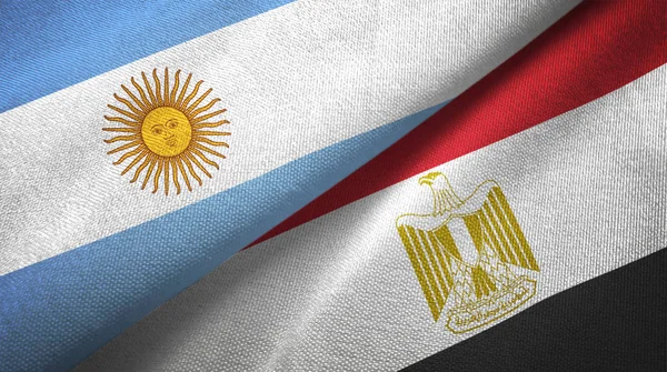 Argentina and Egypt flags together relations textile cloth, fabric texture. Text on egyptian flag means - Arab Republic of Egypt