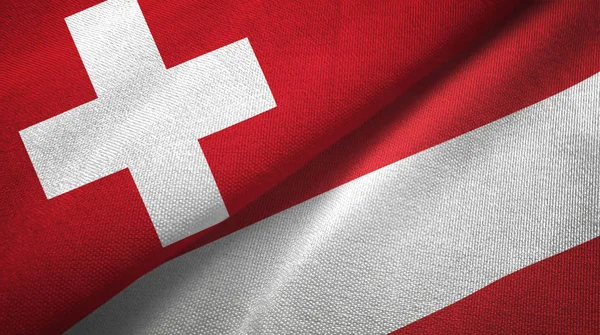 Switzerland and Austria flags together relations textile cloth, fabric texture