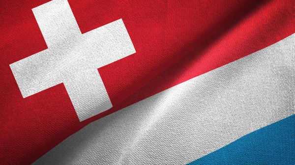 スイス連邦共和国およびルクセンブルク フラグ一緒に関係繊維布 生地のテクスチャ — ストック写真