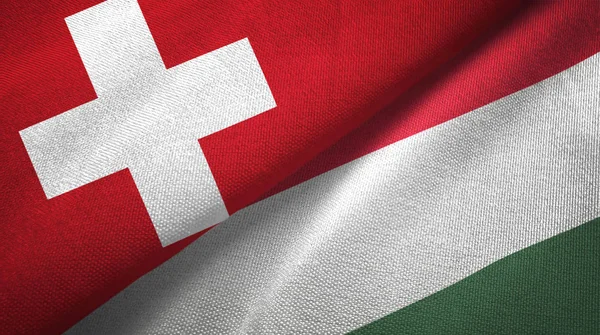Switzerland and Hungary flags together relations textile cloth, fabric texture