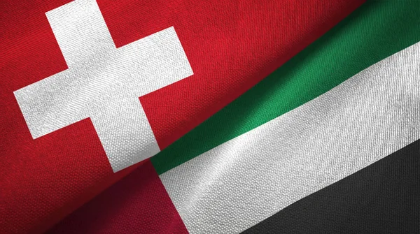 Switzerland and United Arab Emirates flags together relations textile cloth, fabric texture