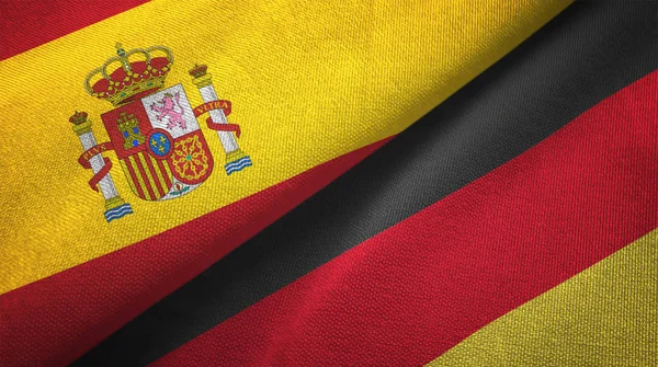 西班牙和德国国旗一起关系纺织布 织物纹理 — 图库照片