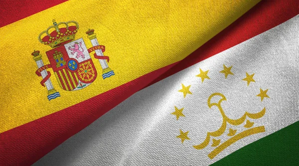 西班牙和塔吉克斯坦国旗一起关系纺织布 织物纹理 — 图库照片